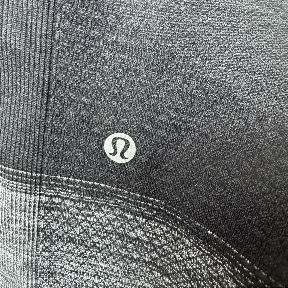 Lululemon Ebb To Street Seamlessly Street Crop Pant Heathered Black Size 4